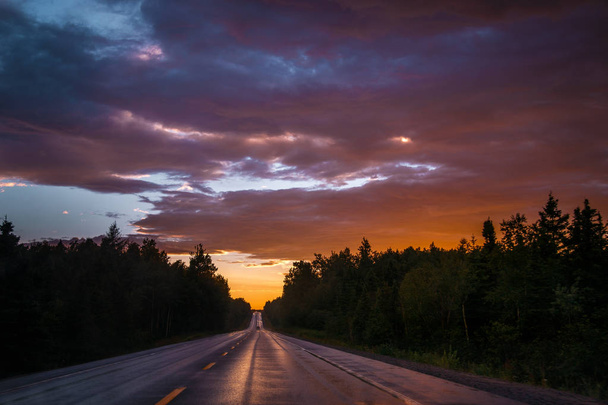 Sunset over on the road at Baie-Comeau - Photo, Image