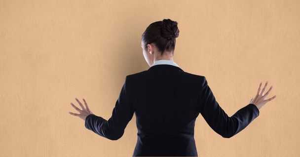 businesswoman touching orange background - Фото, изображение
