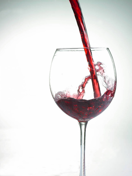 Pouring wine in glass - Foto, Bild