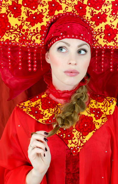 Woman in russian traditional clothes thinking - Fotografie, Obrázek