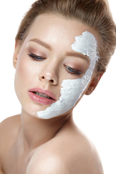 Beauty Face. Beautiful Woman With White Mask On Skin - Fotó, kép