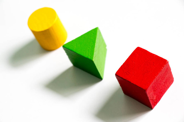 Set of colorful wooden shape toy (Square, triangle, round) on white background - Foto, immagini