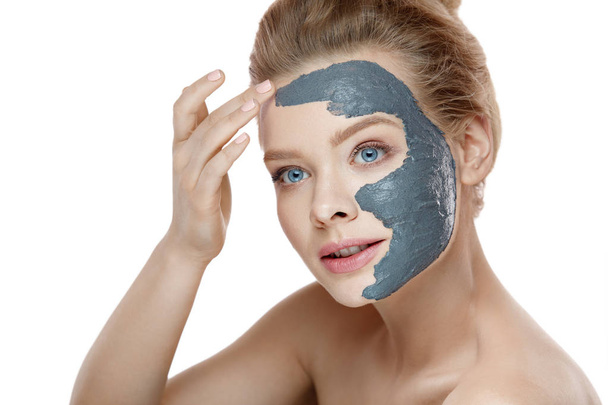 Beauty Face Care. Female With Natural Makeup Applying Clay Mask - 写真・画像