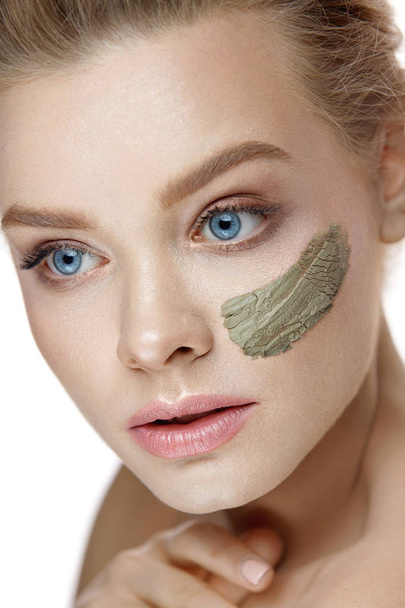 Beauty Face. Beautiful Woman With Stripe Of Clay Mask On Skin - Foto, Bild