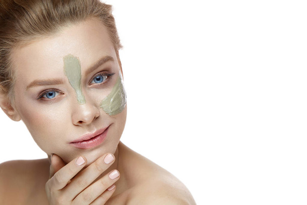 Beauty Cosmetics. Woman With Clay Mask Stripes On Facial Skin - Foto, Bild