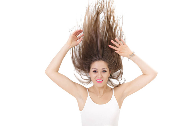 portrait of smiling woman with raised hair up on white background. crazy girl - Fotografie, Obrázek