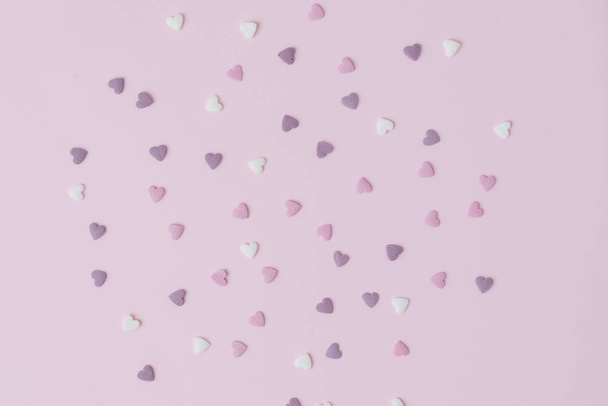 sugar hearts on pink background - Fotografie, Obrázek