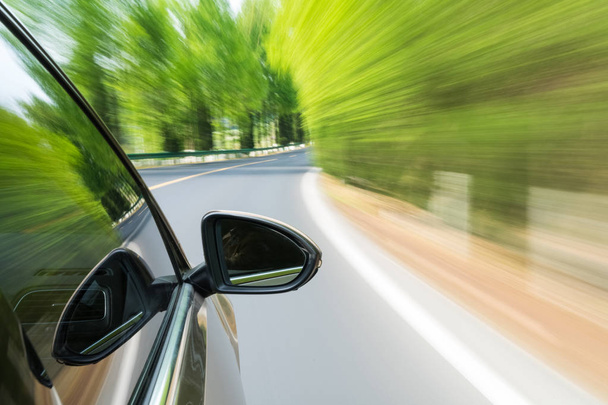 autóval a zöld motion blur - Fotó, kép