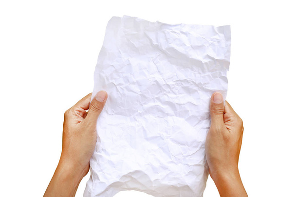 Woman hands holding square crumpled paper against white background. - Foto, imagen
