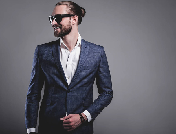 handsome fashion stylish hipster businessman model dressed in elegant blue suit  - Foto, Bild