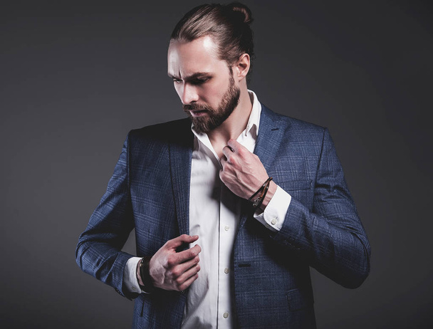 handsome fashion stylish hipster businessman model dressed in elegant blue suit  - Fotoğraf, Görsel