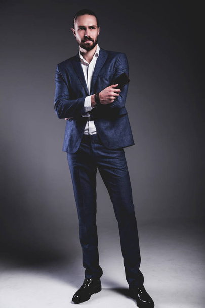 handsome fashion stylish hipster businessman model dressed in elegant blue suit  - Zdjęcie, obraz