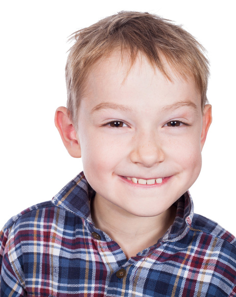 Portrait of young smiling boy. - Фото, изображение