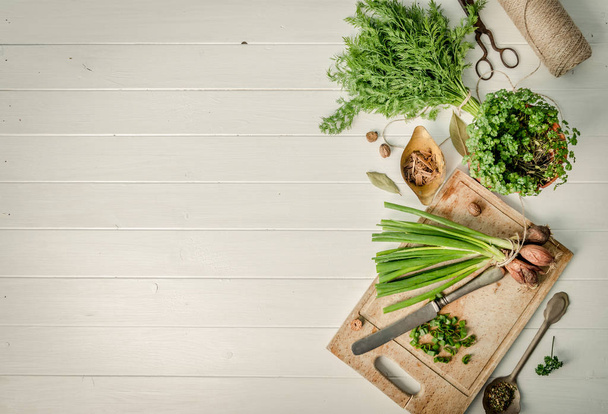 Fresh green onion and dill, text space, topview - Zdjęcie, obraz