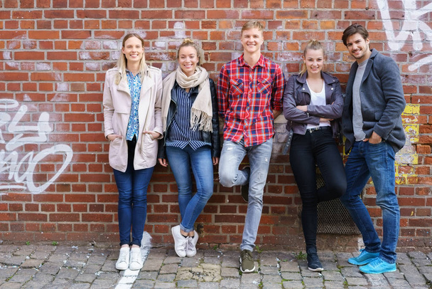 Happy relaxed group of young students - Photo, Image