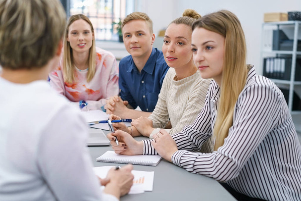 Young business team in a meeting - Фото, зображення