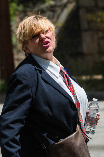 Woman Wearing Suit Impersonates Trump At Atlanta Tax Protest Ral - Photo, Image