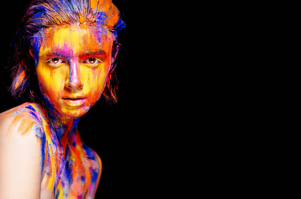 Beautiful woman with paint on face - Foto, Imagem