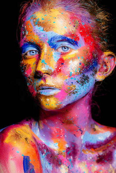 fashion woman with colorful paint - Fotó, kép
