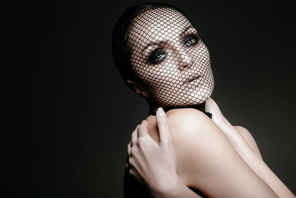 fashion woman with black veil on face - Foto, imagen
