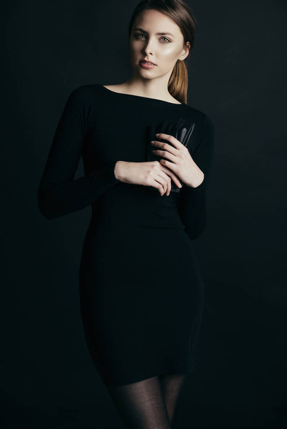 fashion woman in black dress - Фото, зображення