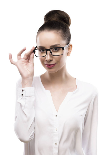 female portrait in glasses on a white background - 写真・画像