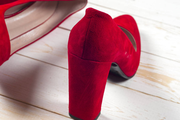 Red female shoes on high heels - 写真・画像