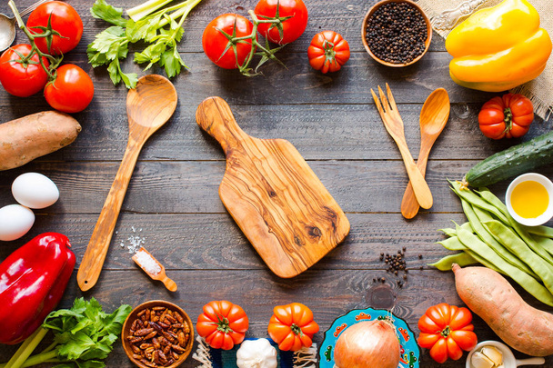 Different types of vegetables, on a old wooden table, space for  - Foto, Imagen