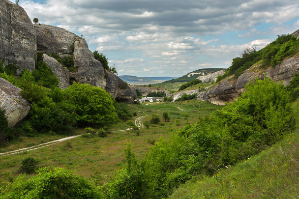 Cave City in Cherkez-Kermen Valley, Crimea - 写真・画像