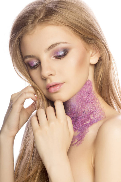 Lovely woman face with bright makeup and glitter on her neck on  - Фото, изображение