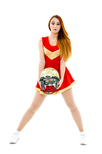 Cheerleader posing wih  helmet - Zdjęcie, obraz