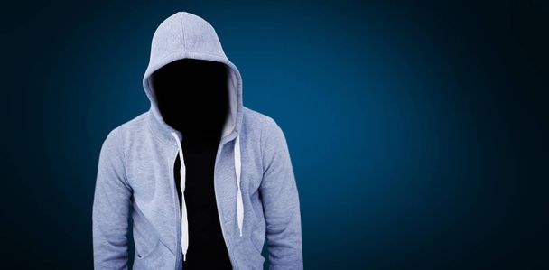 robber wearing gray hoodie - Foto, Imagem
