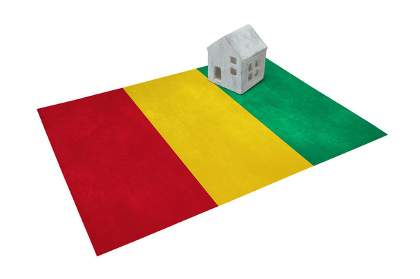 La casita sobre la bandera - Guinea
 - Foto, Imagen