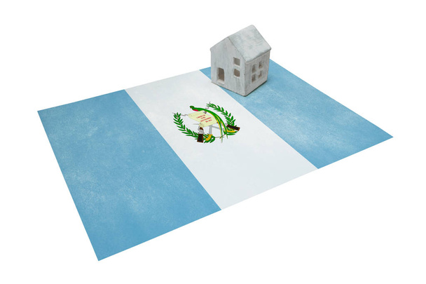 Pequeña casa en una bandera - Guatemala
 - Foto, Imagen