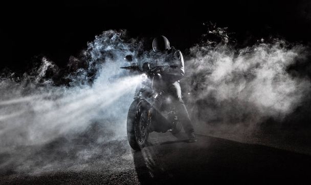 High power motorcycle chopper at night. - Foto, immagini