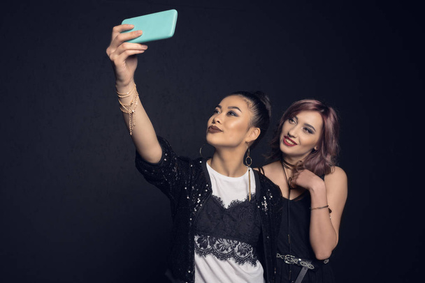 Young women taking selfie  - 写真・画像