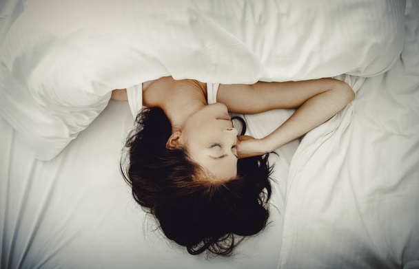 Woman sleeping in bed. - Foto, Imagem