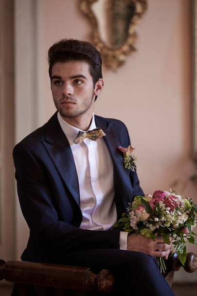 groom looking and thinking  on a sofa - Photo, Image