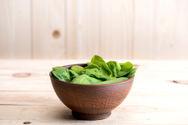 spinach leaves in ceramic bowl  - Photo, Image