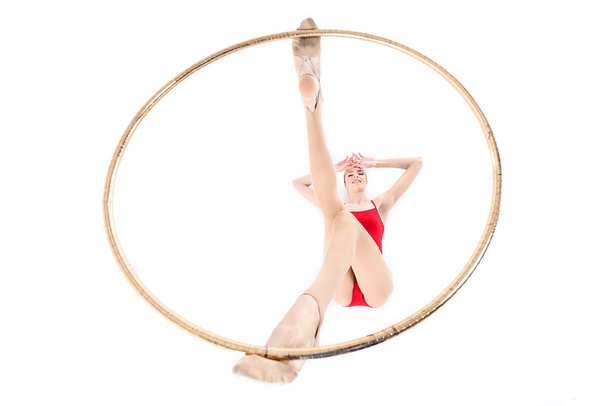 rhythmic gymnast training with hoop - Fotografie, Obrázek