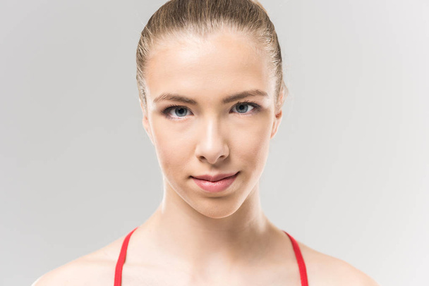 молода біла жінка ритмічна гімнастка
 - Фото, зображення