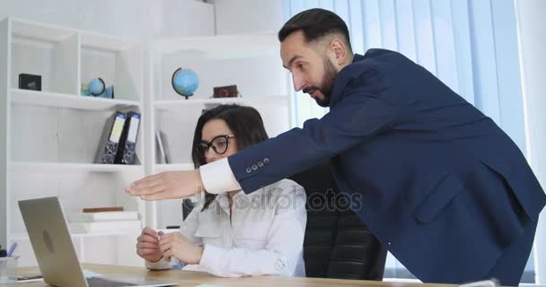 Image of two successful business partners working at meeting in office - Footage, Video