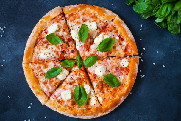 Homemade Pizza with tomato sauce,  olives,  fresh mozzarella, pa - Foto, immagini