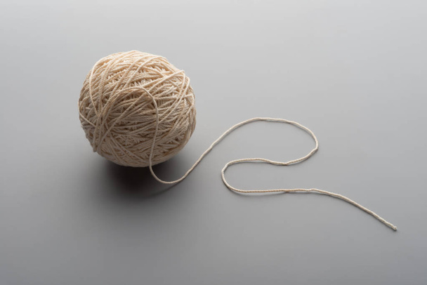 ball of threads on grey background - Foto, immagini