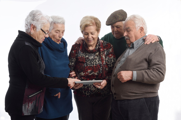 groep van oudere persoon met een digitaal tablet - Foto, afbeelding