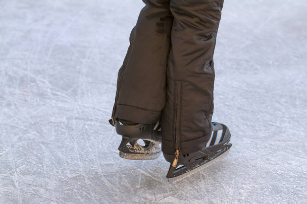 Child on an ice rink - Photo, Image