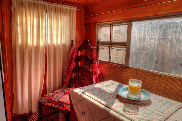 Small retro caravan camper used as a tiny house on road trips - Photo, Image