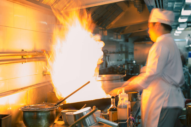 Chef cooking motion blur - Foto, Bild