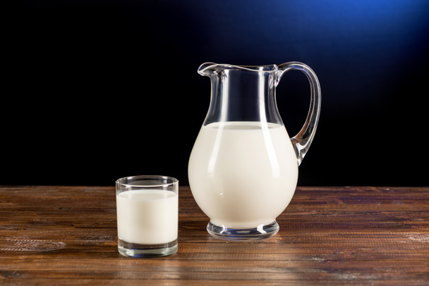 Fresh milk in glass and jug  - Fotoğraf, Görsel