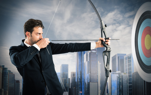 Businessman aiming a target - Photo, Image